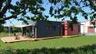 maison ossature bois rouge et grise